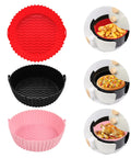 Reusable Silicone Air Fryer Liners Set Of 3, 8.5 Inch Round Basket Liners in red, black, and pink shown in air fryers