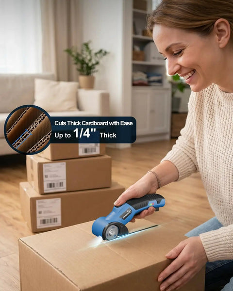 Strebilo Cordless Electric Scissors And Box Cutter For Cardboard used to cut a box with ease, showcasing its sharp blade and LED light.