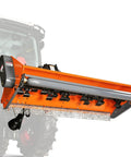 72 Inch Three Point PTO Flail Mower With Eight Inch Left Right Hydraulic Side Shift For 45 85 HP CAT 1 Tractors against a tractor
