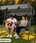 Outdoor Porch Swing With Adjustable Canopy And Durable Steel Frame On Heavy Duty Stand For Patio Backyard Or Garden in use