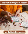 Hella Sturdy Wooden Cross Charms Bulk Pack Of Sixty Pocket Size Beads With Pre Drilled Hole For DIY Necklace Projects And Religious Craft Supplies Top Shelf Quality, displayed with patchwork for prayer quilts.