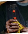 Person holding a component of the Beefy Heavy Duty Hood Latch Kit Eight Pieces For Jeep TJ T Handle