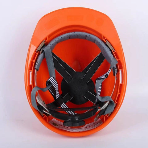 4 Point Hard Hat Replacement Suspension Kit With Shock Absorbing Liner installed in orange hard hat, front view.