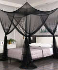 Black Bed Canopy With Mosquito Net For Full Queen And King Size Beds Indoor Or Outdoor Use Easy Access Four Openings All Around Protection From Insects Modern Gothic Halloween Decor Curtains For Bedroom Or Patio installed over a bed
