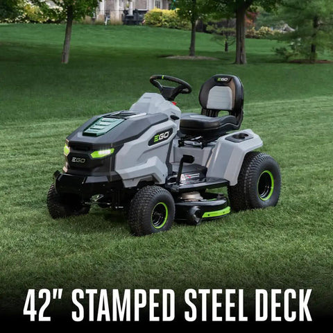 Electric Riding Lawn Mower 42-Inch Deck Cordless Tractor on grass with 42-inch stamped steel deck, 56V battery powered.