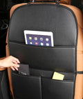 Anti Kick Seat Back Protector For Tesla Cybertruck 2023 And 2024 with storage pockets; faux leather design, tablet holder.