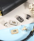 Hella Solid Gold Twist Turn Lock Clasps For Handbags And Purses Heavy Duty Aluminum Alloy rectangle bag closures on a table.