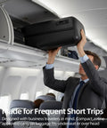 Person placing Hang Safe Carry On Luggage With USB Port And TSA Lock Lightweight Zipperless Hard Shell Spinner Rolling Suitcase in overhead bin