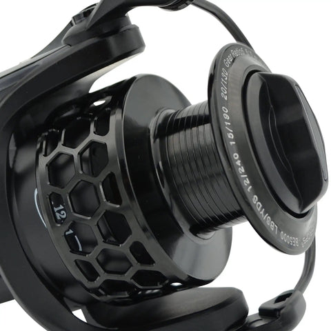 Close-up of Ultra Lightweight Spinning Fishing Reel With 12 Plus 1 Ball Bearings, carved aluminum spool, anti-reverse.
