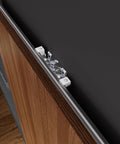 Concealed Sliding Barn Door Hardware Kit With Soft Close Mechanism And Invisible Floor Track For Wall Mount Installations 32 Inch Rail Fits Minimum Opening Width Of 24 Inches Aluminum Construction Door Not Included, close-up view of top-mount mechanism on wood door.