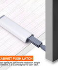 4 Pack Push Latch Cabinet Door Catch For Drawers And Bookcases No Fuss Push To Open Mechanism shown under a cabinet door