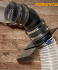 Super Handy Two And A Half Inch Dust Collection Fittings Kit With Elbow Connectors showing elbow and clamps against wooden background