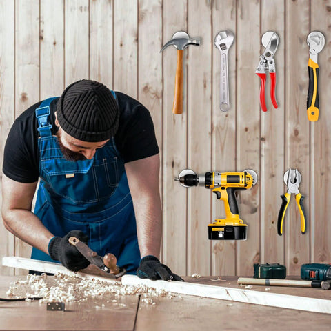 Installed FINDMAG 4-pack neodymium disc magnets with double-sided adhesive on wooden workshop wall