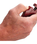 Hand holding a red Self Powered Timing Light With Daylight Readable Xenon Bulb, Self Contained Automotive Ignition Timing Tool.