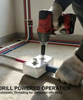 Automatic Electrician Wire Puller Drill Powered Cable Threading Rig in use with drill and electrical conduit wiring at job site.