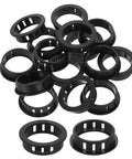 15 Pack Round Cable Snap Bushing Grommets One And Quarter Inch 32mm Black Snap In Cable Grommet Protectors in a pile