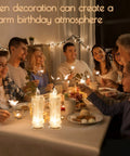 Family gathered around table with Two Pack LED Flameless Candles With Realistic Flicker Flame for festive birthday atmosphere