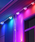 Heavy Duty All Season Extension Cable Set 6 Pack Featuring Three Y Branch Plugs And Three Sixteen Foot White Leads illuminated on wall.