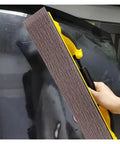 Hot 70X420mm Rectangular Dry Sanding Mesh Paper With Back Flocking For Car Putty Board Smoothing orange mesh with yellow handle on car surface.