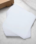 100 Piece Foam Pouches For Fragile Dishes And Glassware, Double Sided Cushioning Sleeves Protect Cups Mugs And Bowls During Moving, Shipping Or Storage, 11.8 Inch Square Foam Wraps For Breakable Tableware. White 11.81 x 11.81 in EPE foam pouches stacked on table