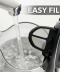 1.5L Borosilicate Glass Electric Kettle With Auto Shut Off, Boil Dry Protection, BPA Free, filling with water at sink