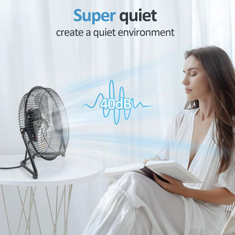 Three Speed Portable Metal Floor Fan With Adjustable Tilt For Home Office And Bedroom Quiet Operation Lightweight Yet Sturdy Black Nine Inch Chill Breeze For Desk Or Floor Use, showing quiet operation with a woman reading.