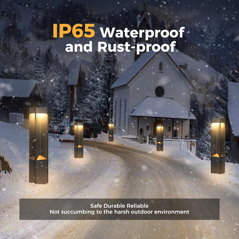 Hella Bright Black Pathway Lights Outdoor Landscape Bollard Lamps illuminating a snowy path, showcasing waterproof design and warm glow.