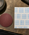 Heavy Duty Aluminum Oxide Sandpaper for waterproof projects, 400 grit round sheet, great for polishing and finishing tasks.