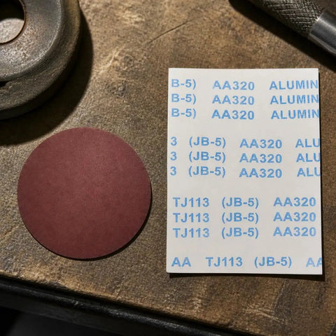 Heavy Duty Aluminum Oxide Sandpaper for waterproof projects, 400 grit round sheet, great for polishing and finishing tasks.