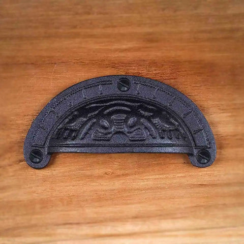 Premium Black Wrought Iron Cup Pulls 4 X 2 Inch Cabinet Drawer Handles Pack Of Six on wooden surface.