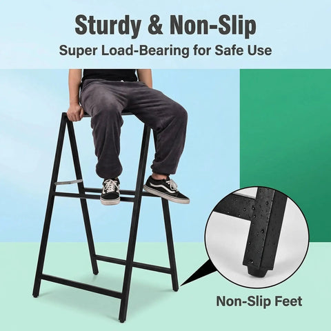 Person sitting on sturdy black Double Sided A Frame Sign 24 By 36 Inch Boss Grade Heavy Duty Folding Sandwich Board with non-slip feet