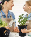 Value Pack Of 120 Pcs 1 Gallon Plastic Plant Nursery Pots With Drainage Holes shown in use for home gardening