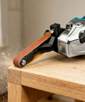 Upgrade Any Angle Grinder To A Belt Sander Instantly on a wooden surface for woodworking and rust removal.