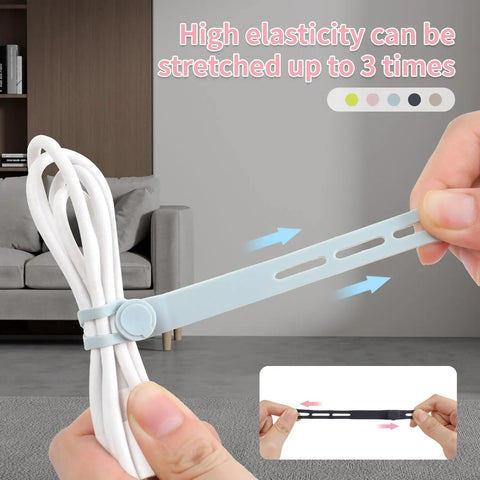 Person stretching a blue silicone cable tie around white cords, showcasing high elasticity and durability up to 36 cm.