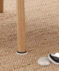 Twenty Four Pack Round Gray Self Adhesive Furniture Sliders Heavy Duty Moving Pads For Carpet Hardwood Tile Floors Easy Chair Table Sofa Glides That Roll Like Butter On Any Floor Type on chair leg.