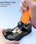 Using punch down tool from 7-In-1 Pro Grade Network Tool Kit for Fast DIYer Ethernet Builds to connect Ethernet cables.