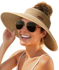 Woman wearing Womens Straw Sun Hat With Ponytail Hole And Wide Brim Beach Visor Khaki Ultimate Sun Protection For Beach Trips