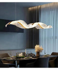 Modern Led Chandelier With Water Ripple Effect Top Shelf Dimmable Pendant Light For Dining And Living Rooms, 180 cm, in a stylish dining room.