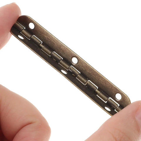 Close-up of Vintage Continuous Jewelry Box Hinges 12 Pack, 6 Hole Narrow Edge Flush Butt Hinges in bronze finish