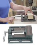 Beefy 3 Inch High Carbon Steel Drill Press Vise with raised widened jaws holding wood for precise woodworking and metalworking.