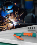Durable 800 Amp Welding Stinger Electrode Clamp With Ergonomic Curved Handle on a workbench in a welding workshop.