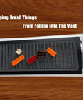 Magnetic Floor Register Vent Cover 4x10 Inch Screen Mesh on wooden floor with small items on top, preventing debris entry.