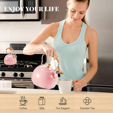 Woman using Pink Stainless Steel Tea Kettle For Stove Top 2.6 Qt Whistling Kettle With Wood Pattern Folding Handle in kitchen