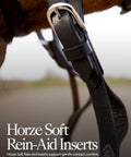 Close-up of black soft elastic rein aid inserts for horses rein extensions that improve contact and promote soft hands