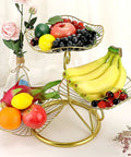 3 Tier Fruit Basket Stand With Ventilated Metal Wire Trays holding various fruits, modern iron fruit holder for countertop.