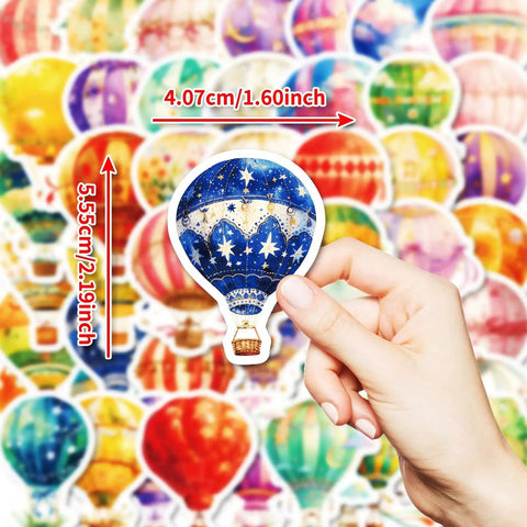 Hand holding watercolor hot air balloon sticker from the Watercolor Hot Air Balloon Sticker Pack Dope 50 Designs Waterproof Vinyl For Journaling Laptops Water Bottles Planners Scrapbooks Phone Cases Luggage Skateboards And More Adventure Aesthetic Decor.