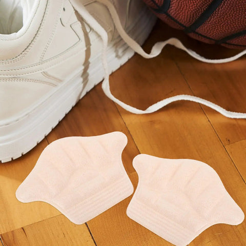 Game Changing Heel Grips And Liner Cushions To Tighten Up Loose Shoes Anti Chafing Beige Shoe Inserts for snug fit next to sneakers.
