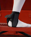 Stealth Lace-Free Ankle Brace For Left Or Right Ankles on foot, ultra lightweight support with flex-support stays, secure cleat fit.