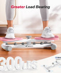 Close-up of Heavy Duty Waist Twister Machine For Killer Core Workouts, showing capacity of 300 lbs with pink textured footplates.