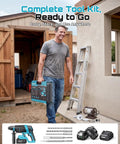 Man holding a box with Go Cordless With This 1-Inch SDS-Plus Rotary Hammer Drill Featuring Brushless Motor, toolbox and batteries shown.